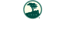 Pebble Beach Resorts heritage logo color white text