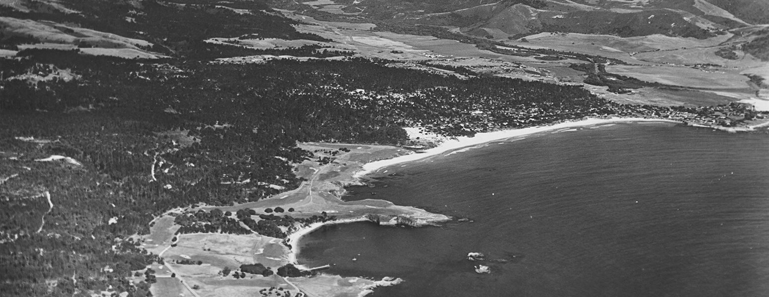 black and white aerial view of pebble beach golf course