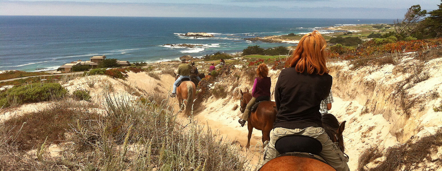 Horse back riding on sand dunes
